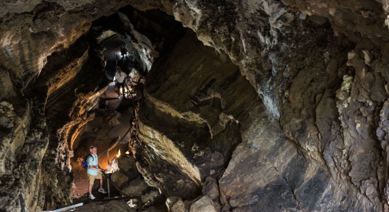 Highlands - Santa Cruz in Galapagos Islands with tourist in lava tube