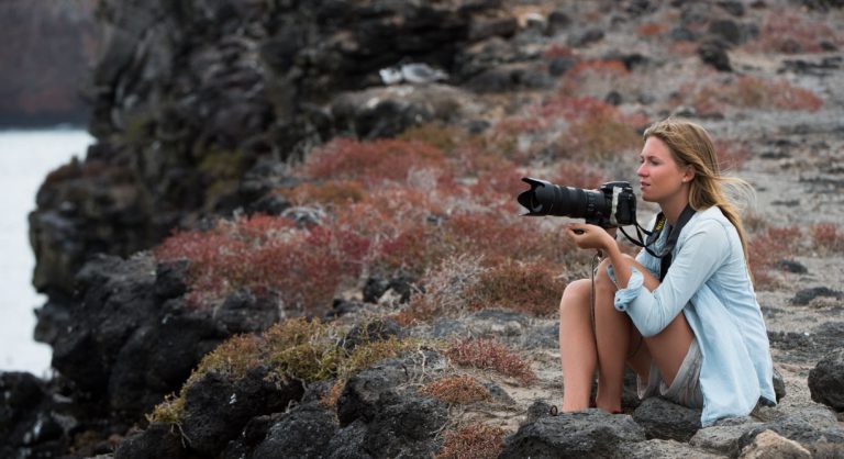 South Plaza in the Galapagos island with photographer tourist