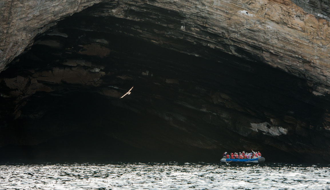 Vicente Roca Point in Isabella Island, tourist on panga ride